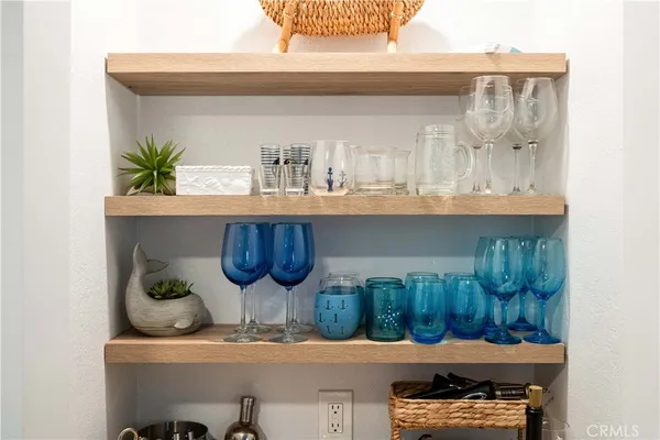 a kitchen with a table and cabinets