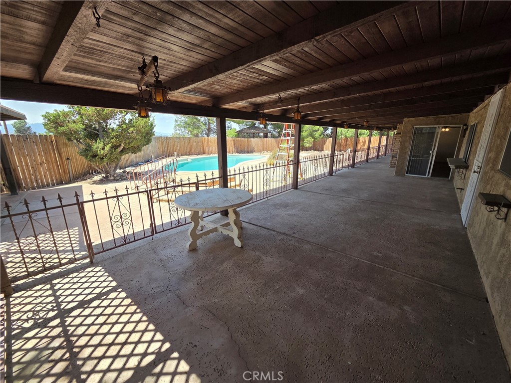 19145 Tomahawk Road Apple Valley, CA 92307 - Photo 27 of 38 a view of a porch