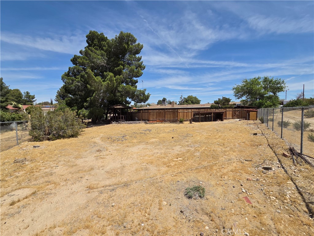 19145 Tomahawk Road Apple Valley, CA 92307 - Photo 33 of 38 a view of swimming pool with an outdoor seating