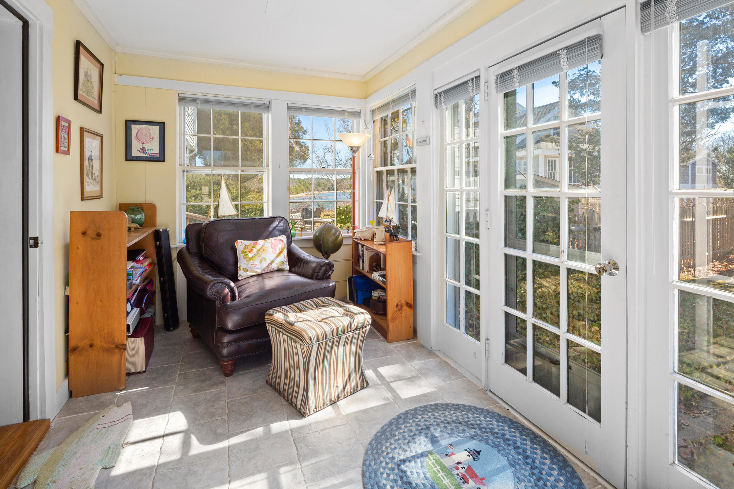 115 Commercial Street, Unit B Wellfleet, MA 02667 - Photo 19 of 37 a living room with furniture and a window