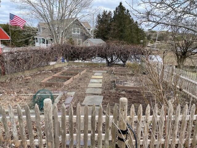 115 Commercial Street, Unit B Wellfleet, MA 02667 - Photo 28 of 37 a view of house with yard and trees