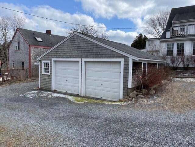 115 Commercial Street, Unit B Wellfleet, MA 02667 - Photo 30 of 37 a wooden house with a outdoor space