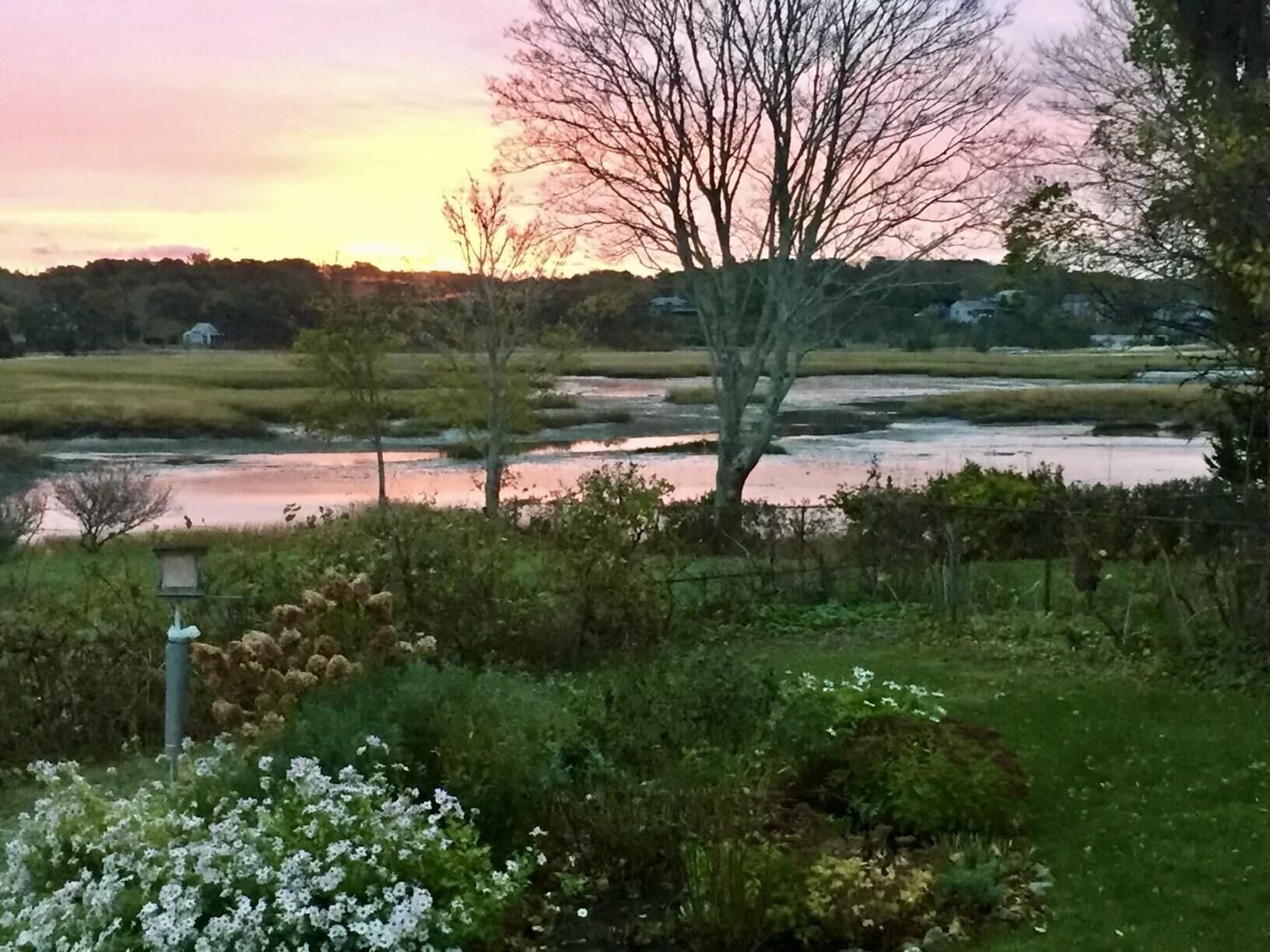 115 Commercial Street, Unit B Wellfleet, MA 02667 - Photo 3 of 37 a view of lake with green space