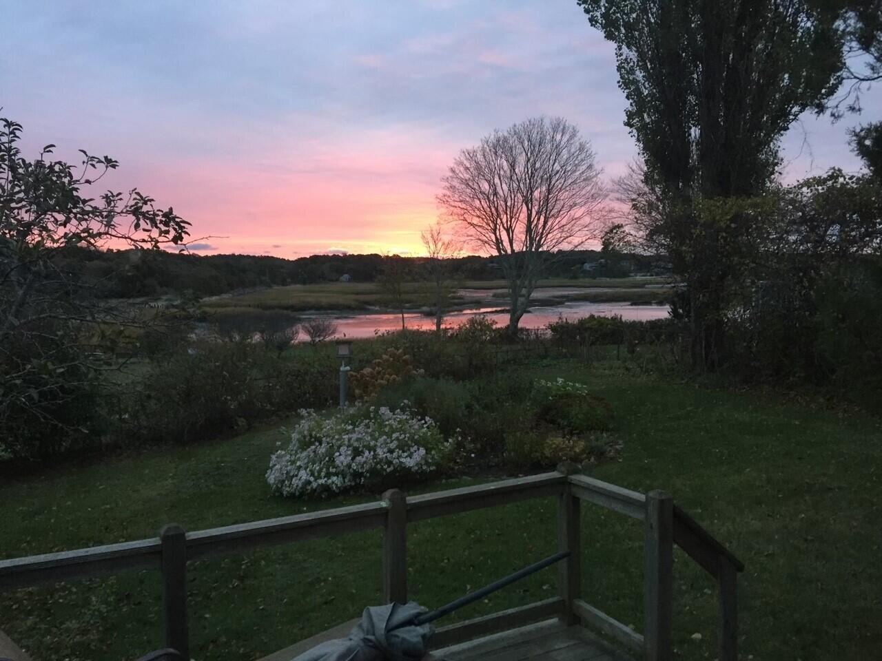 115 Commercial Street, Unit B Wellfleet, MA 02667 - Photo 34 of 37 a view of a lake from a balcony