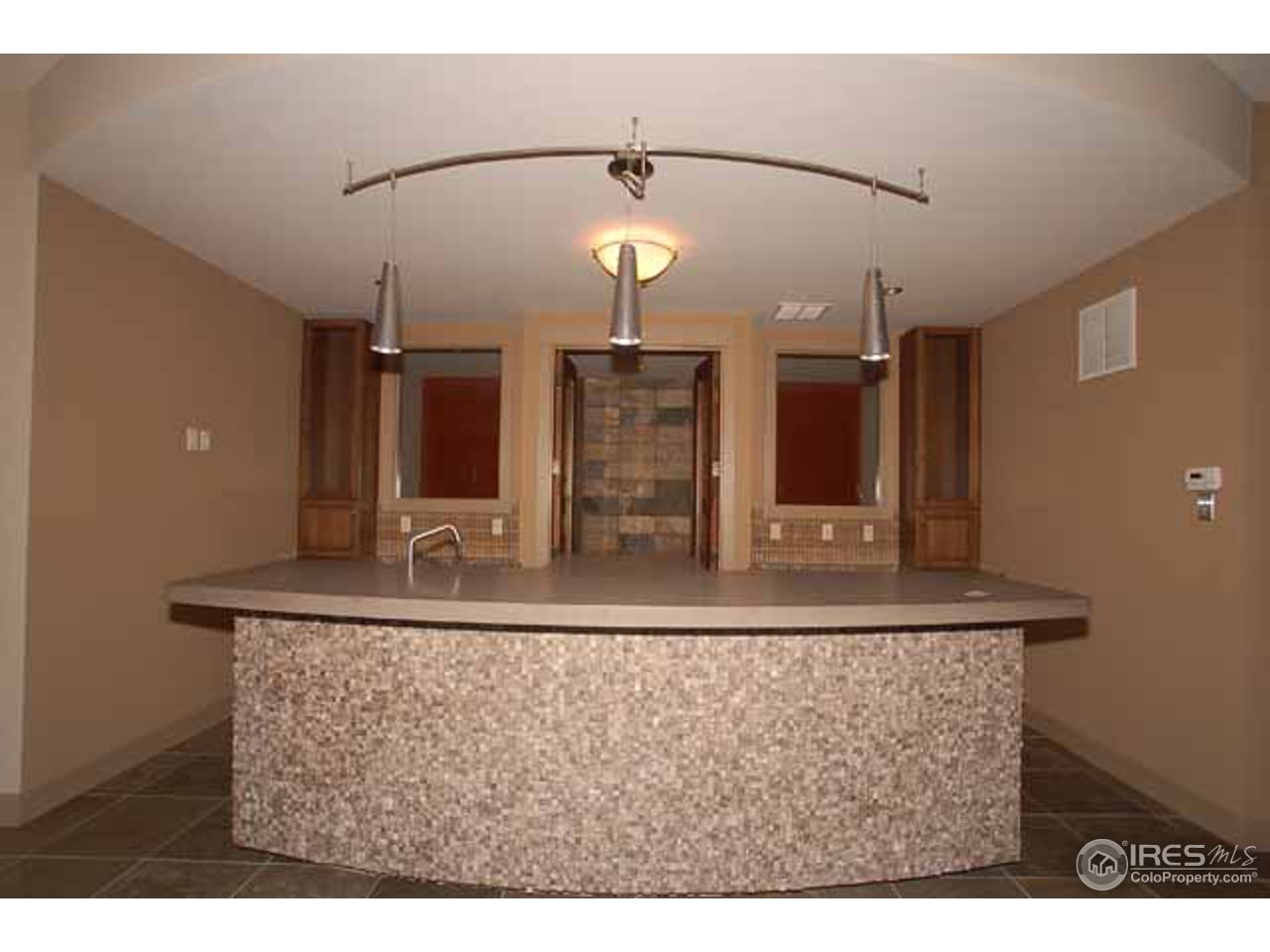 1960 Stony Hill Road Boulder, CO 80305 - Photo 6 of 25 Bar with wine room behind
