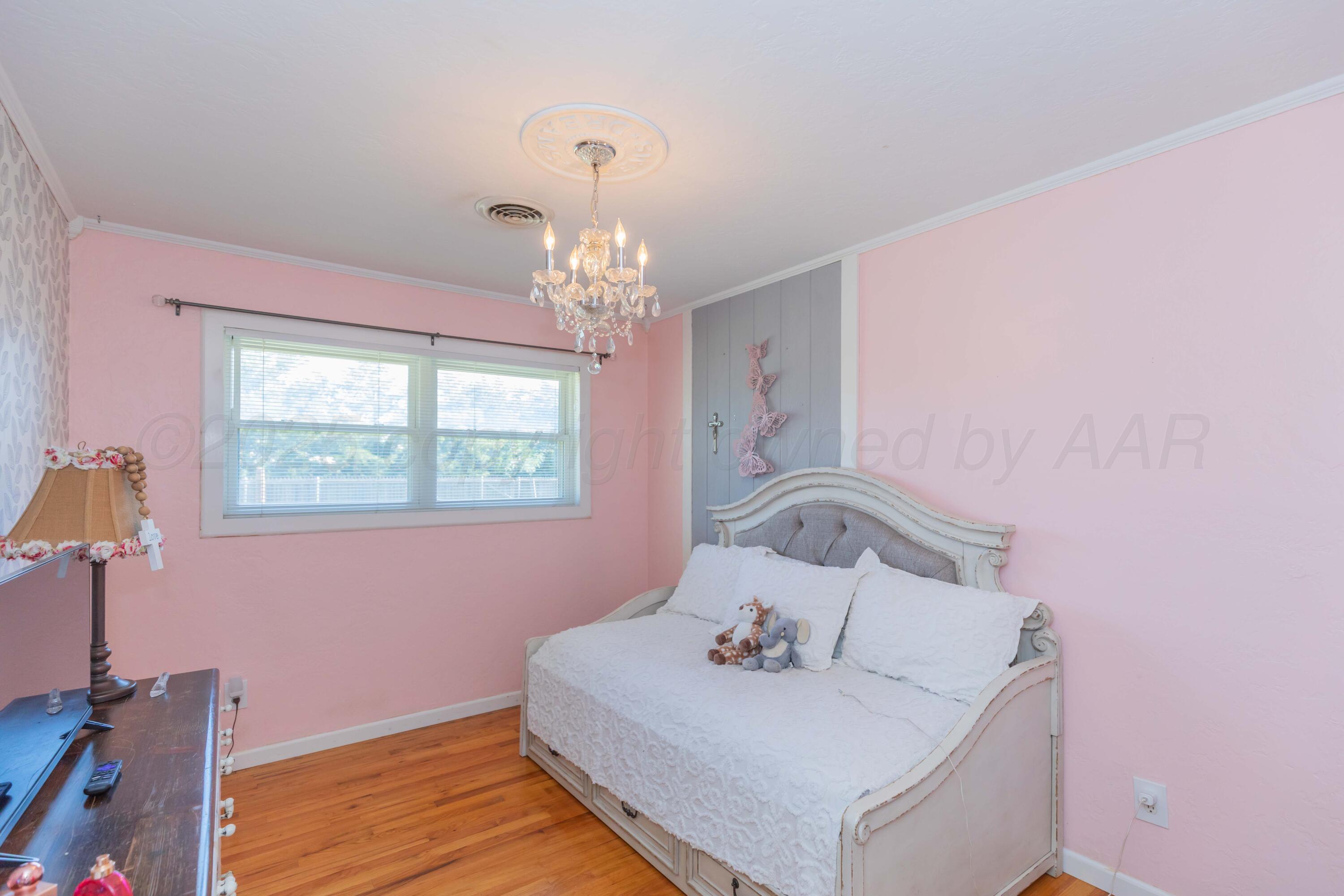 315 Pratt Street Claude, TX 79019 - Photo 20 of 38 a bathroom with a sink and a mirror