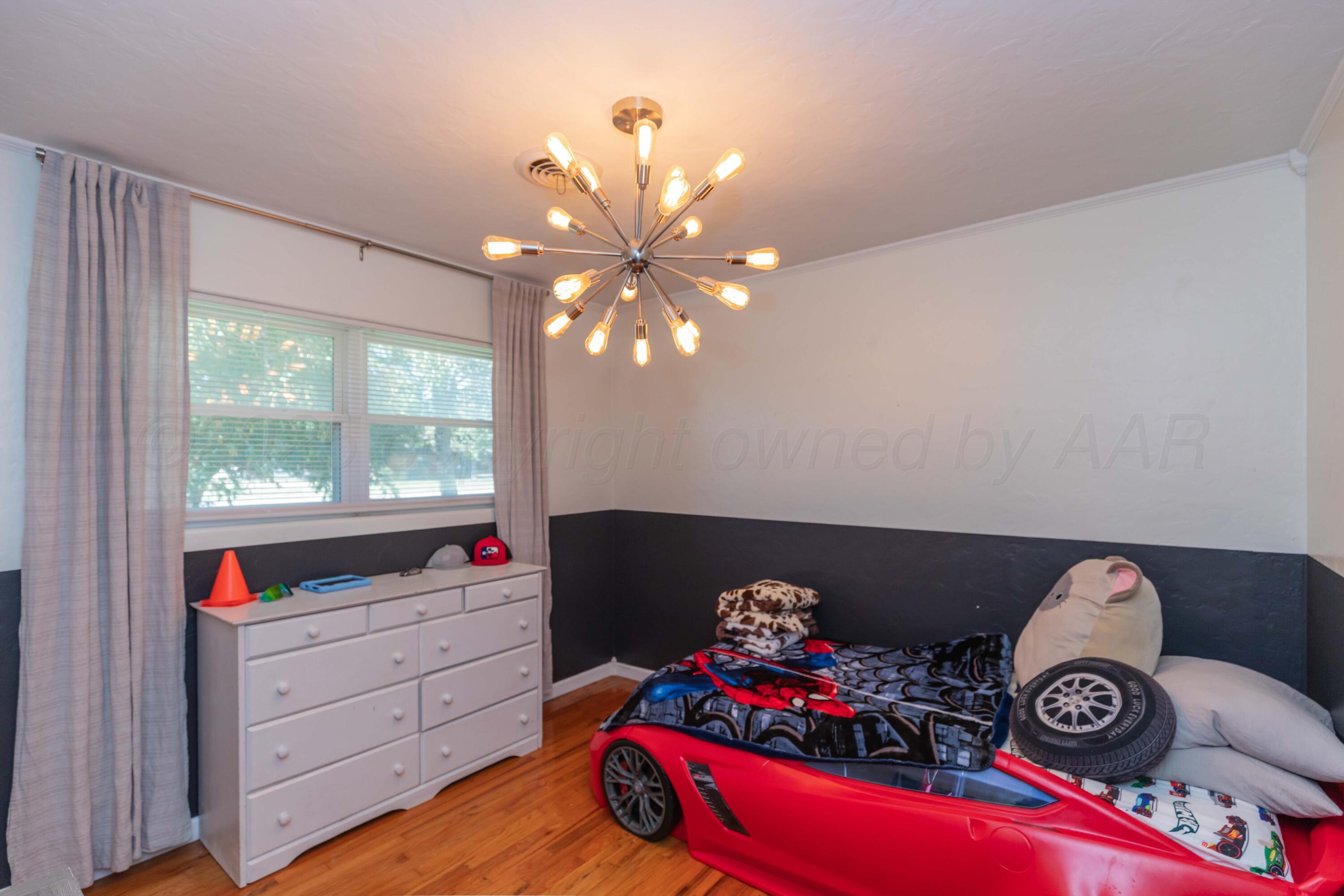 315 Pratt Street Claude, TX 79019 - Photo 28 of 38 a room with toys and a large window