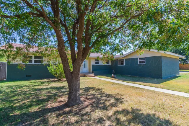 a house view with a outdoor space