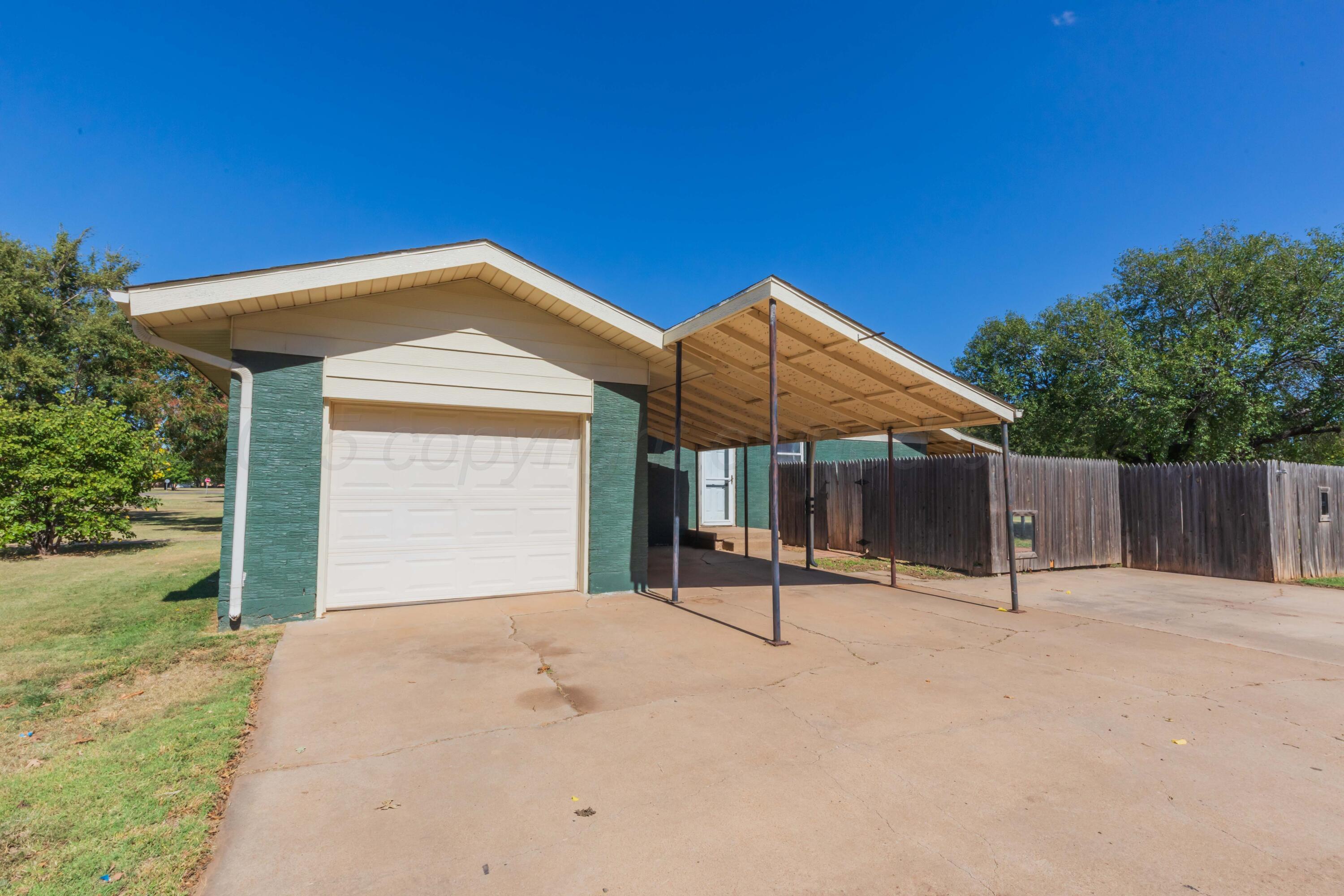 315 Pratt Street Claude, TX 79019 - Photo 38 of 38 a view of a house with backyard and a tree