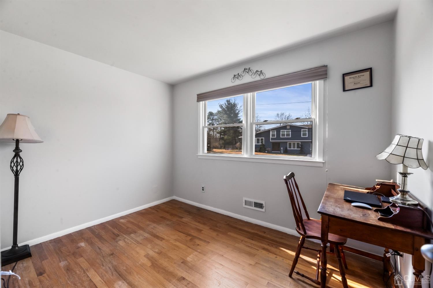 51 Agate Road East Brunswick, NJ 08816 - Photo 17 of 27 a workspace with wooden floor