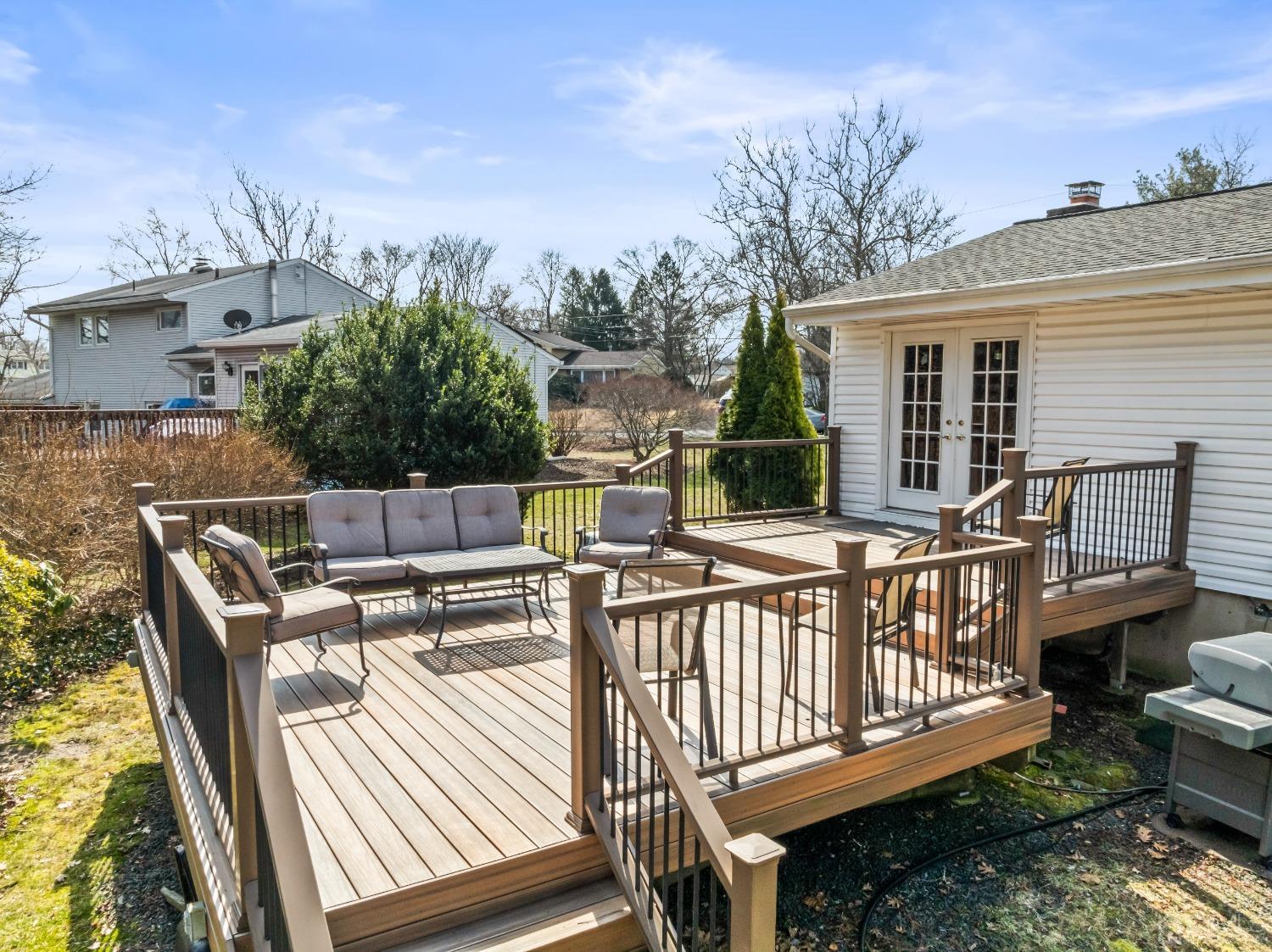 51 Agate Road East Brunswick, NJ 08816 - Photo 20 of 27 a view of a deck with two chairs and a table