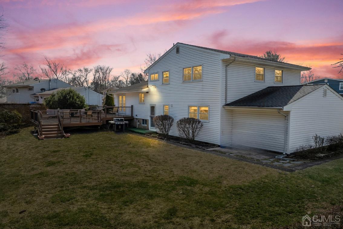 51 Agate Road East Brunswick, NJ 08816 - Photo 27 of 27 a front view of a house with a garden and sitting area