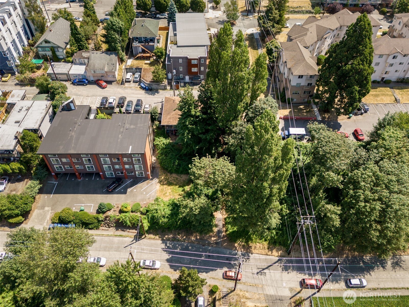 1306 South Bayview Street Seattle, WA 98144 - Photo 5 of 13 an aerial view of a house with a yard basket ball court and outdoor seating
