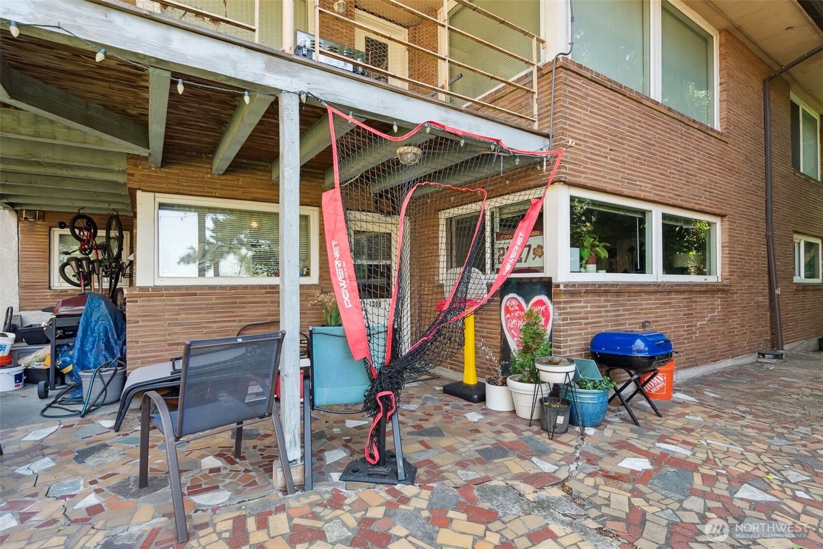 1306 South Bayview Street Seattle, WA 98144 - Photo 8 of 13 a view of patio area with table and chairs
