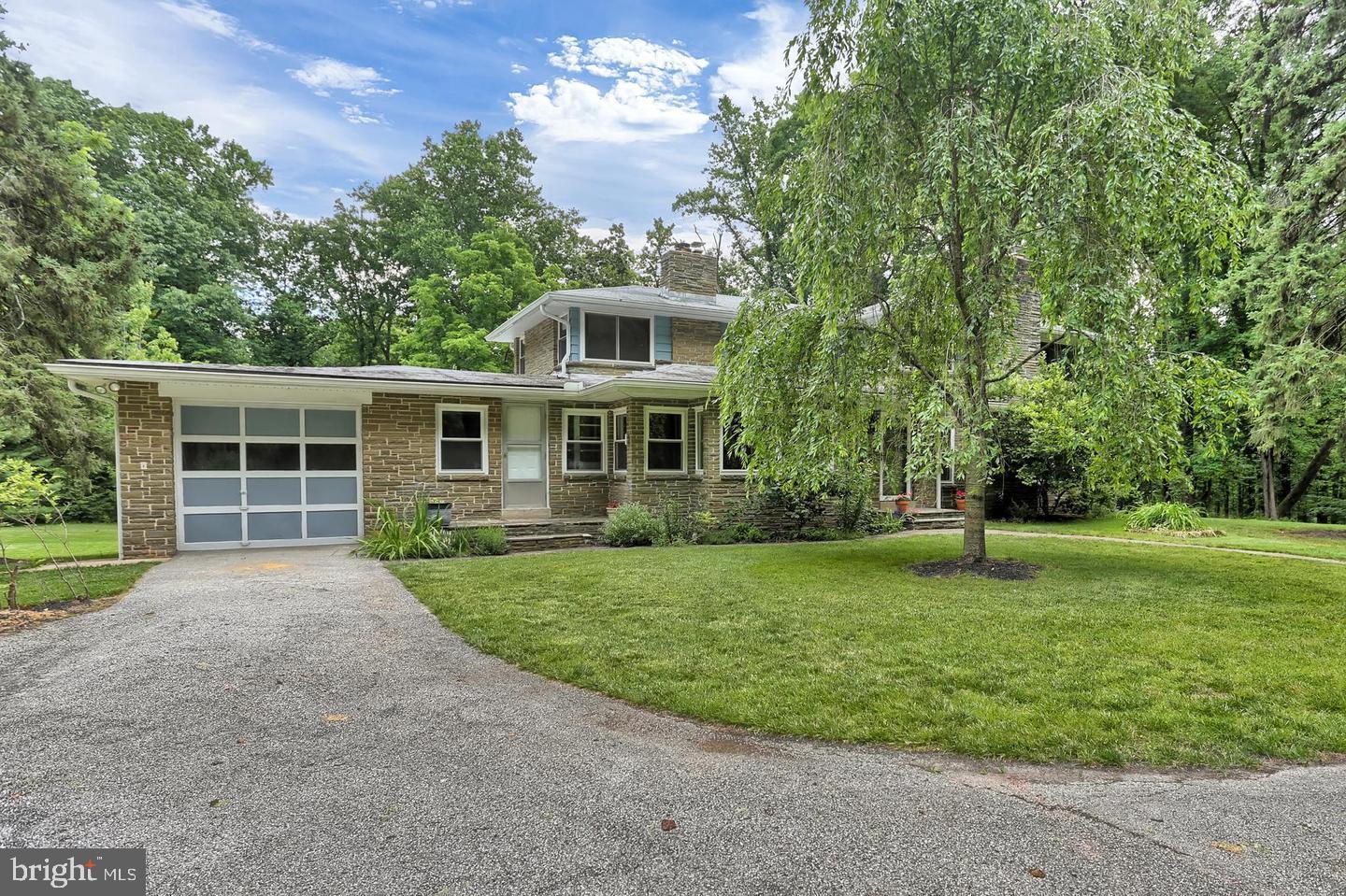 175 Pickett Road Dover, PA 17315 - Photo 2 of 36 Charming home with lush greenery.