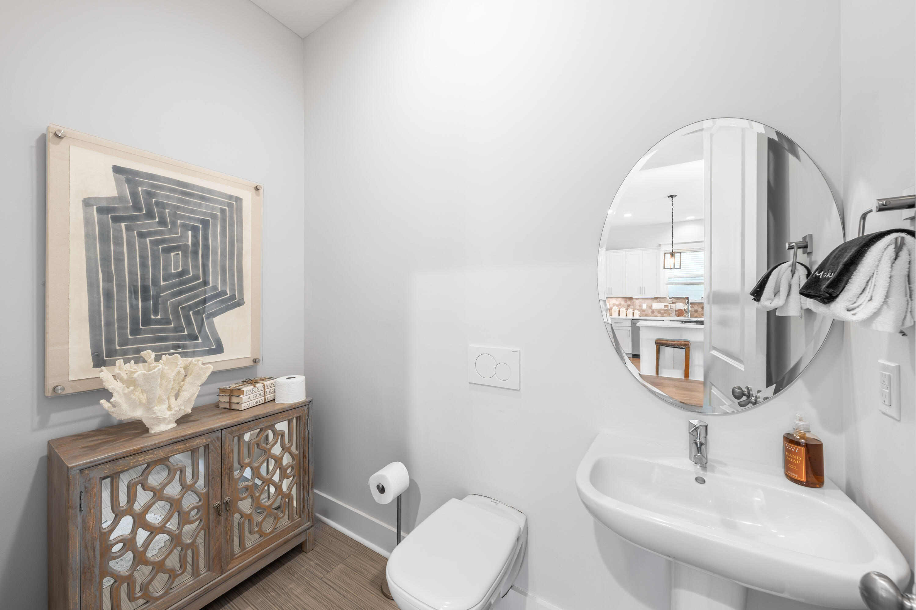 222 Valdare Ln Inlet Beach Inlet Beach, FL 32461 - Photo 12 of 39 a bathroom with a sink a toilet and mirror