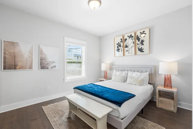 a bedroom with a bed and a view of bathroom