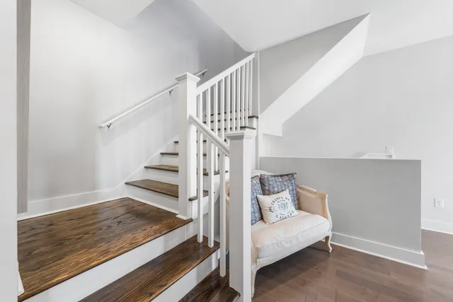 a view of a balcony with wooden floor