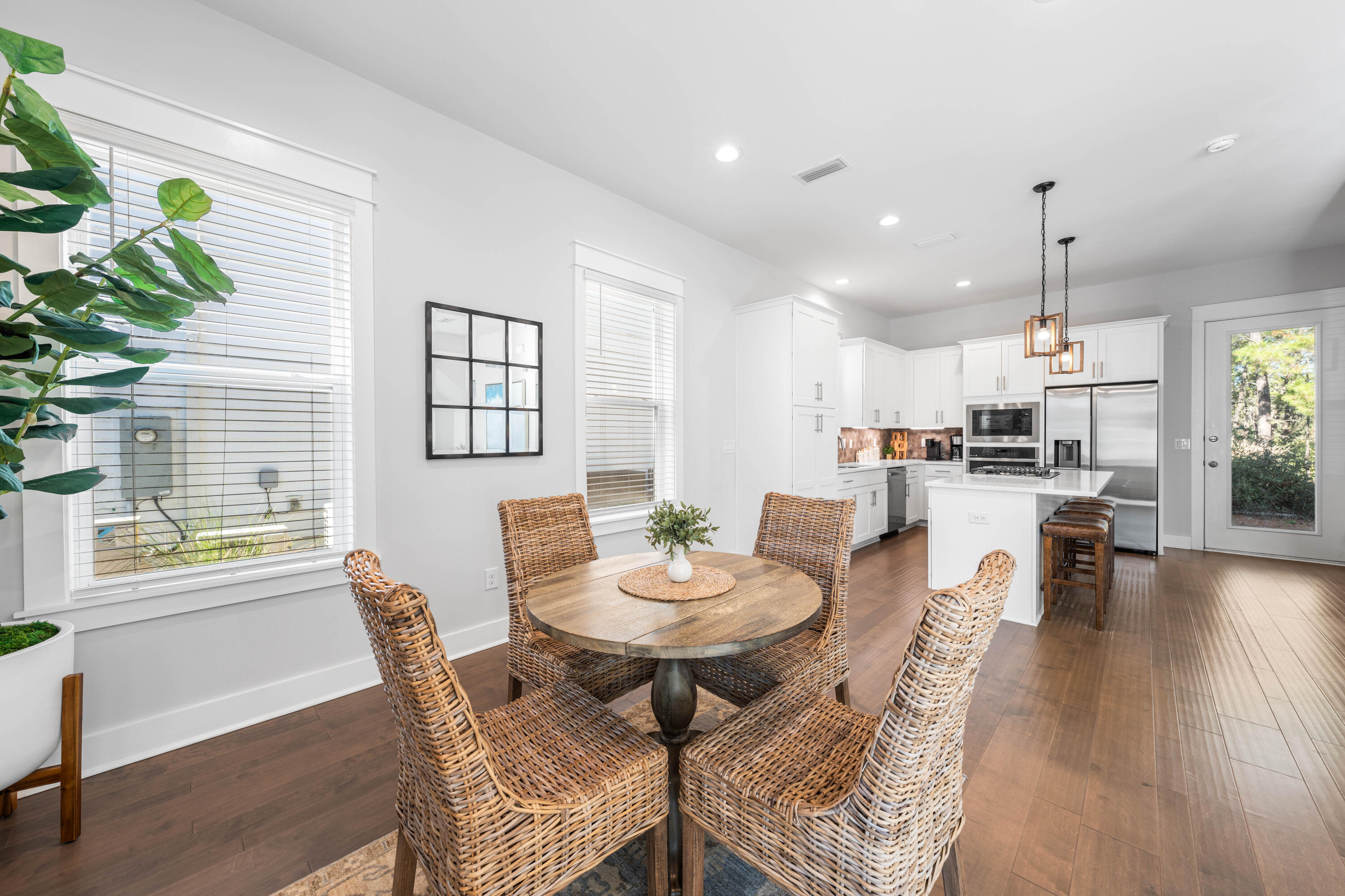 222 Valdare Ln Inlet Beach Inlet Beach, FL 32461 - Photo 5 of 39 a view of a dining room with furniture and wooden floor