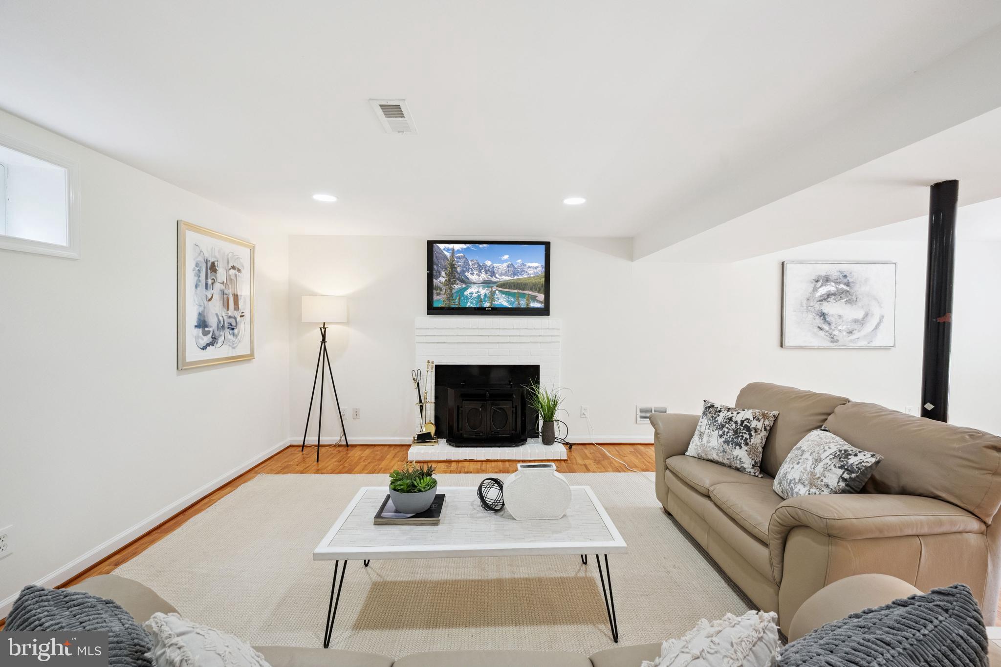 7035 Calamo Street Springfield, VA 22150 - Photo 23 of 39 Rec Rm w/Wood Burning Masonry Fireplace