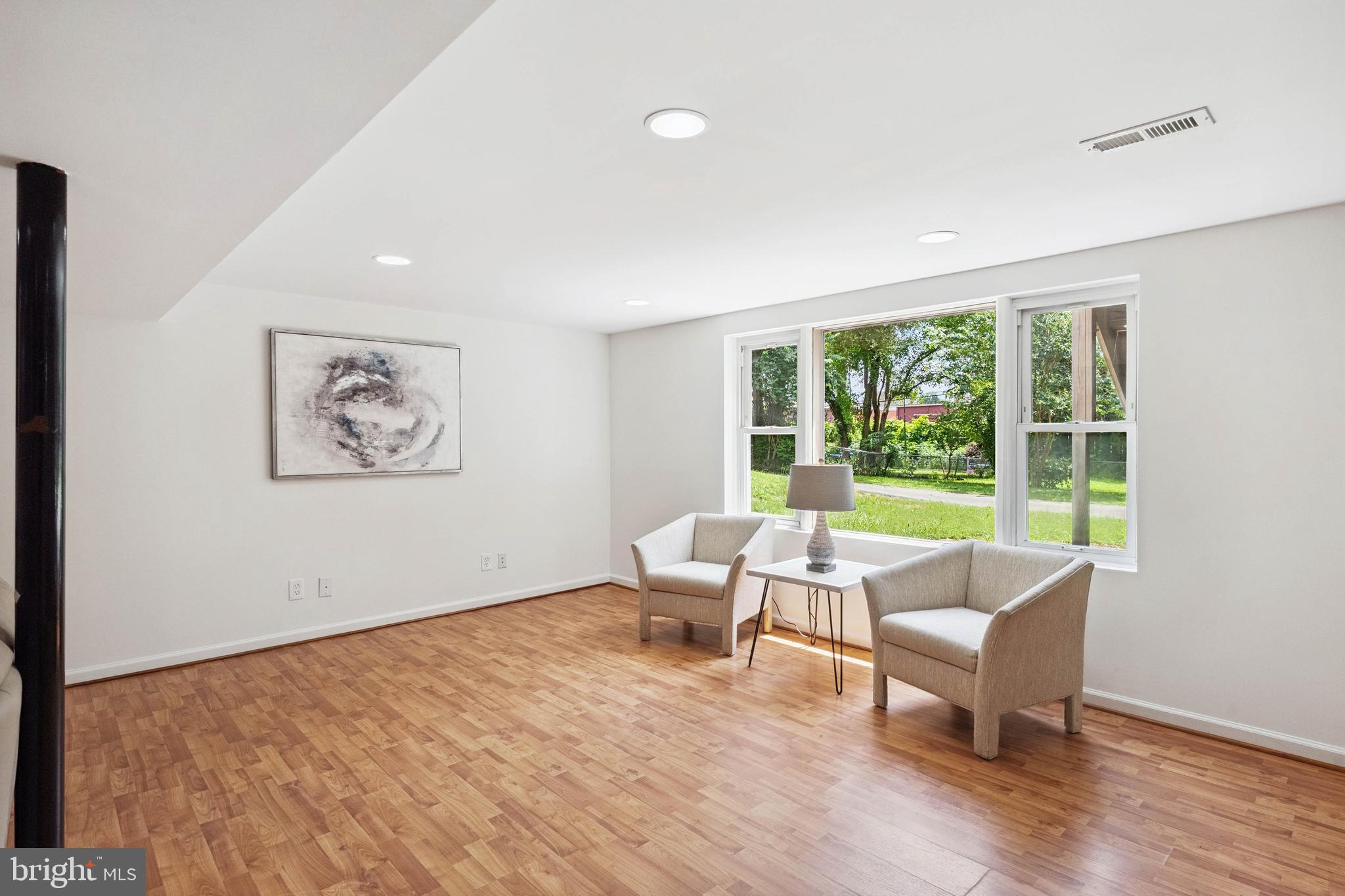 7035 Calamo Street Springfield, VA 22150 - Photo 25 of 39 Party Size Rec Rm w/ Vinyl Plank Flooring