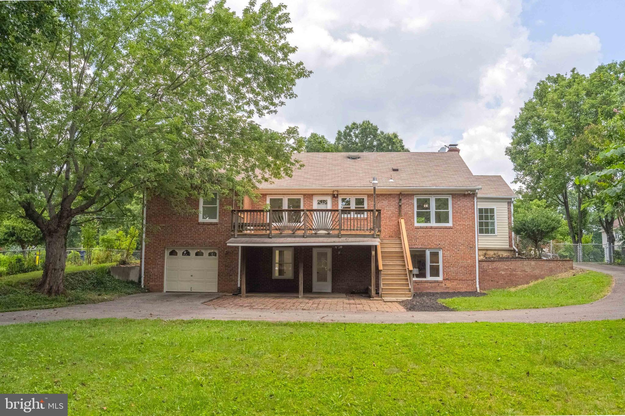 7035 Calamo Street Springfield, VA 22150 - Photo 33 of 39 Huge Lower Level Paver patio off Rec Rm