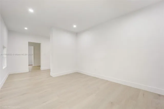 an empty room with an entryway