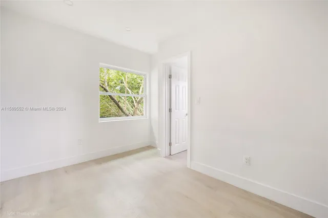 an empty room with closet