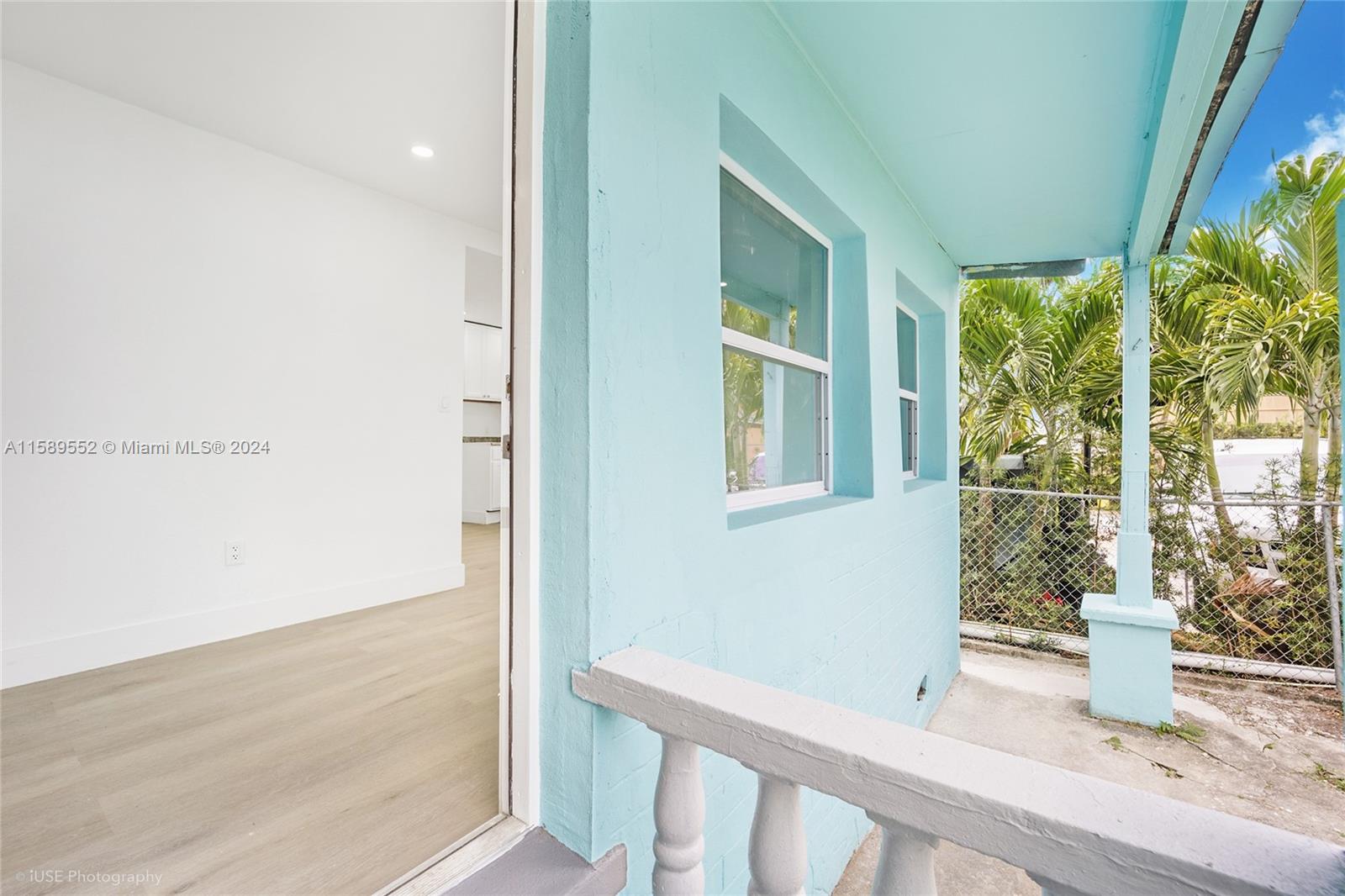 2130 Northwest 28th Street Miami, FL 33142 - Photo 2 of 48 a view of front door