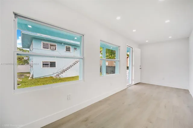 a view of an house with a swimming pool