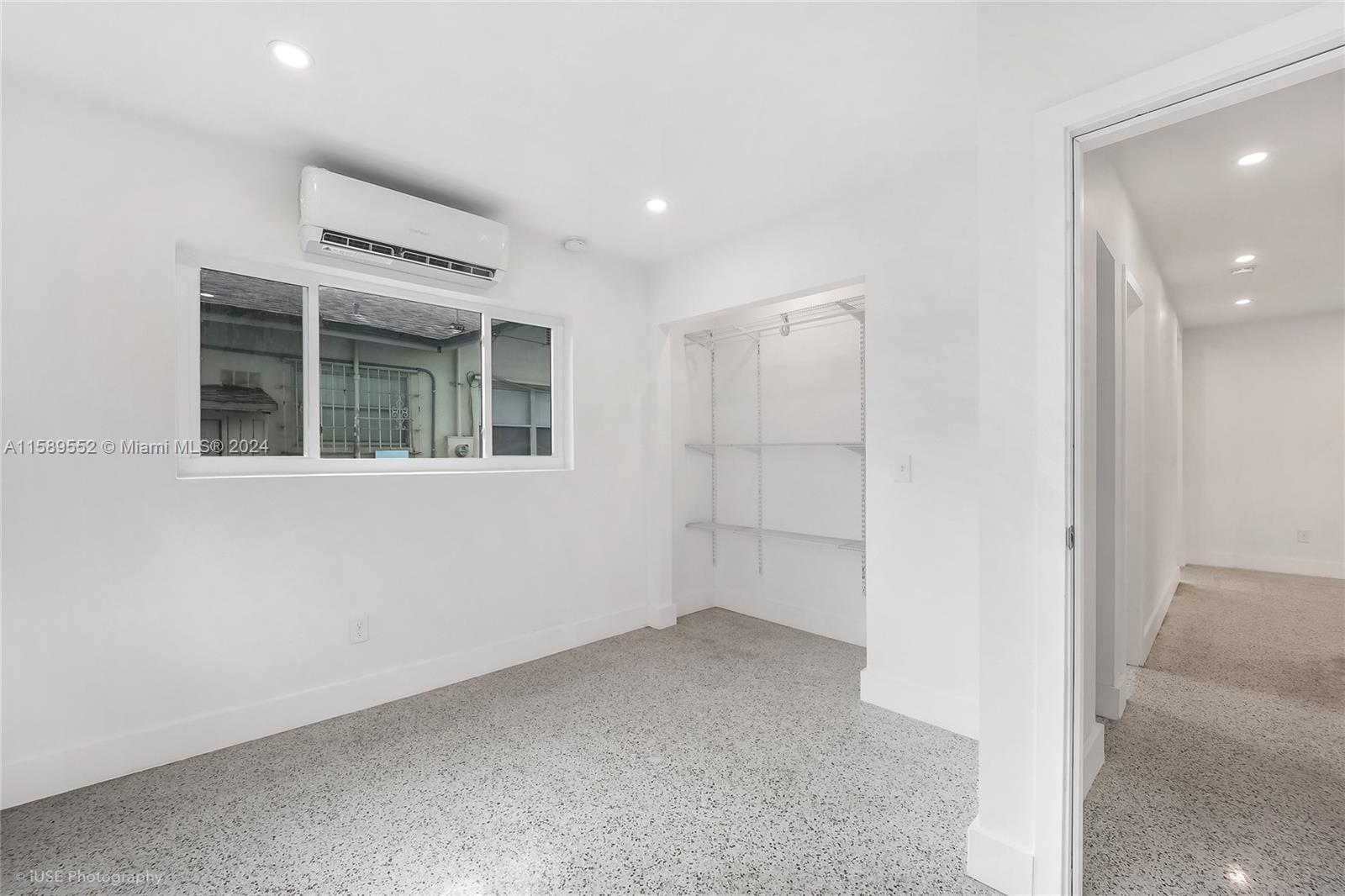 2130 Northwest 28th Street Miami, FL 33142 - Photo 41 of 48 an empty room with windows
