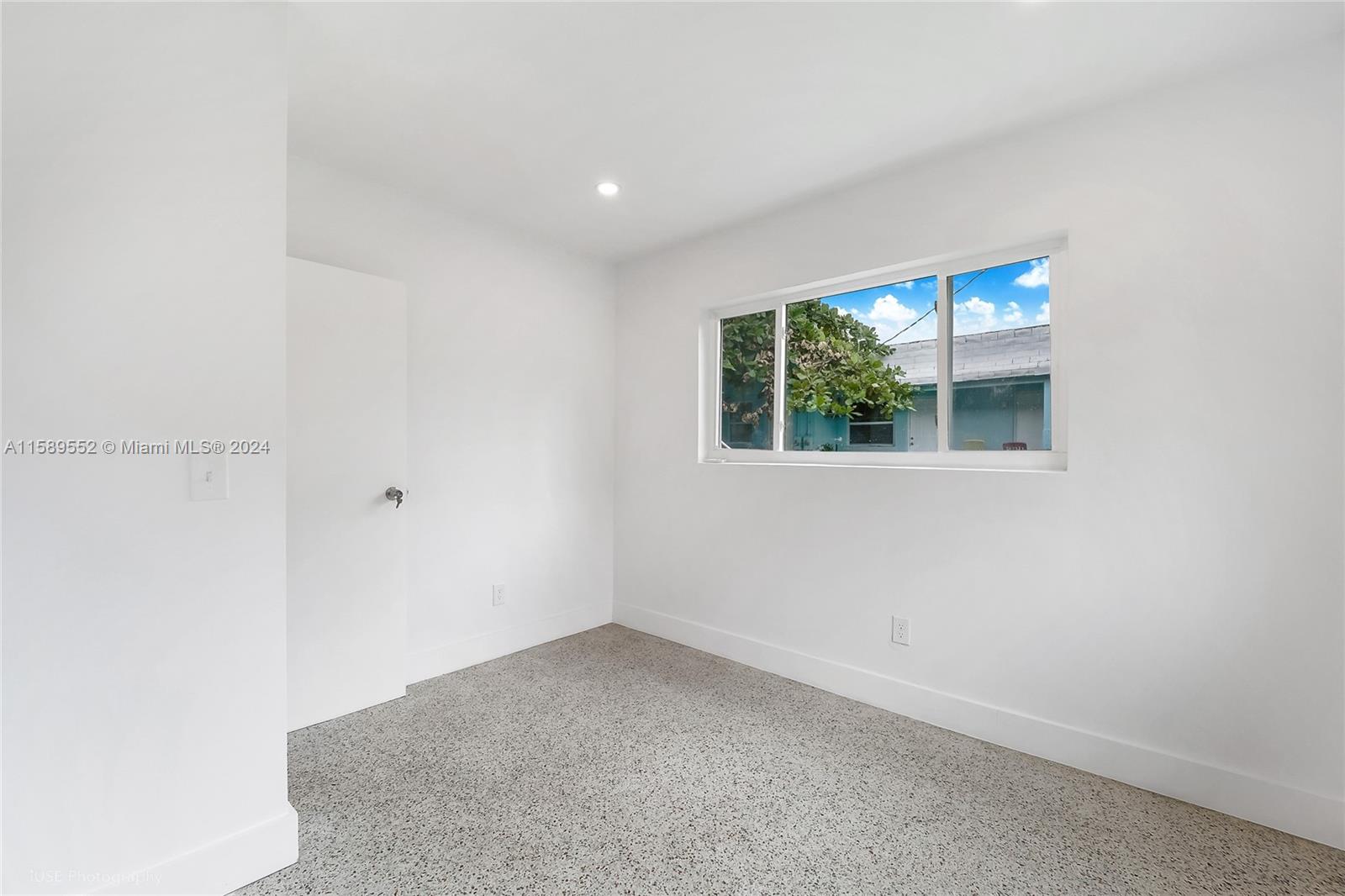 2130 Northwest 28th Street Miami, FL 33142 - Photo 43 of 48 a view of empty room with window