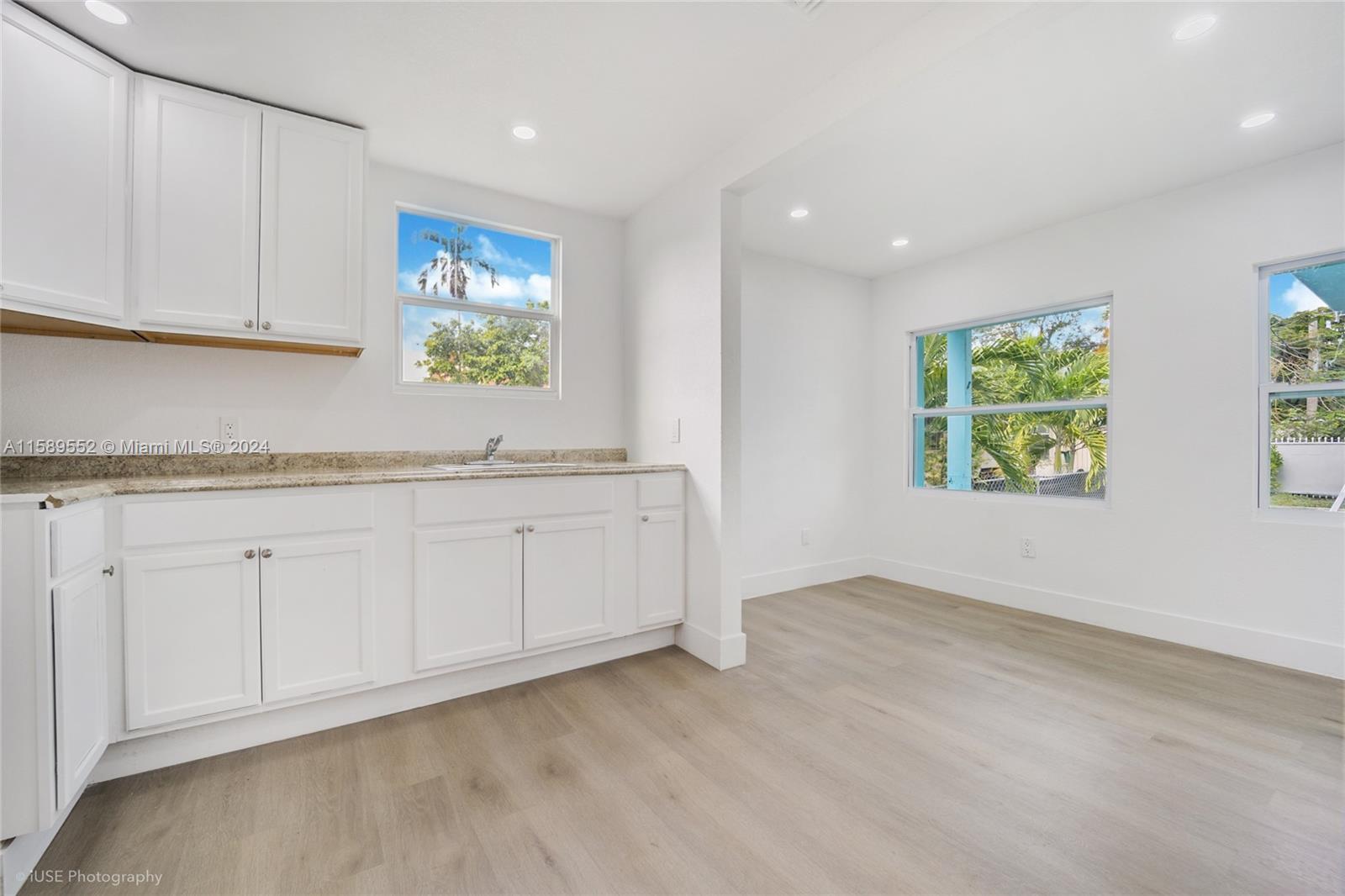 2130 Northwest 28th Street Miami, FL 33142 - Photo 5 of 48 a view of a kitchen with electric appliances