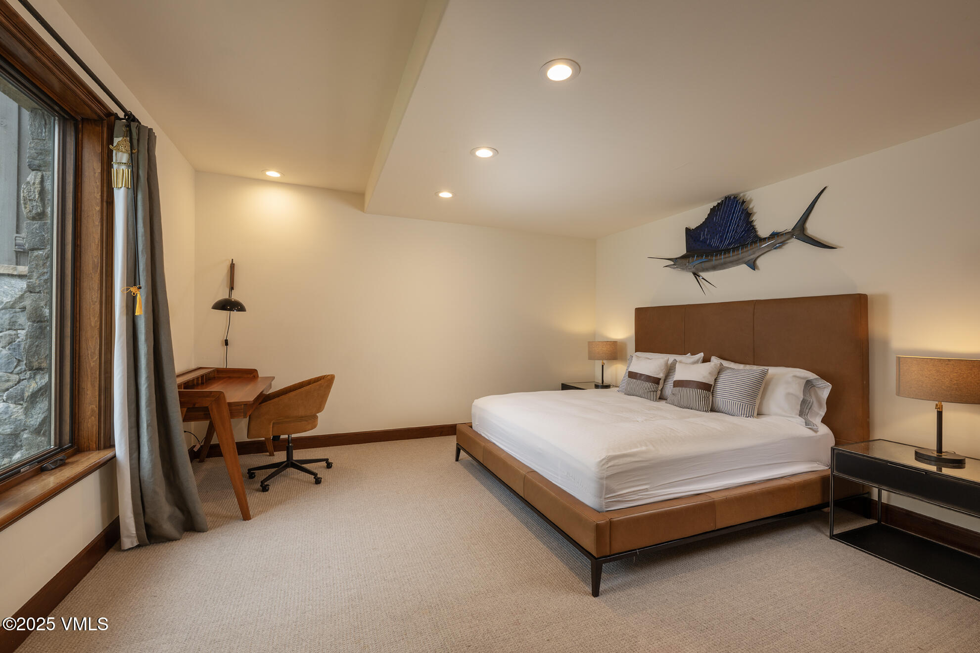 185 Forest Road Vail, CO 81657 - Photo 11 of 13 a bedroom with a bed and a chair