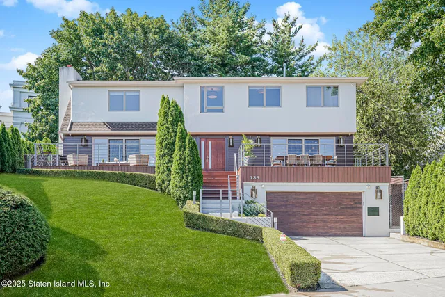 a house view with a garden space