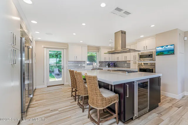 a bathroom with a toilet a sink and bathtub