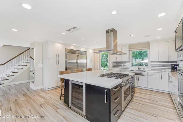 a bedroom with a bed and a lamp