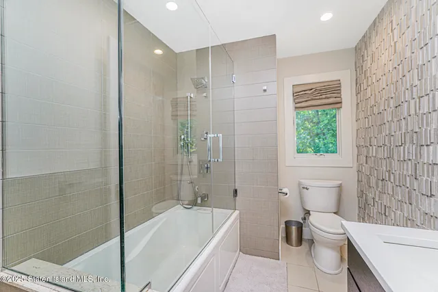 a view of a patio with a table and a chairs