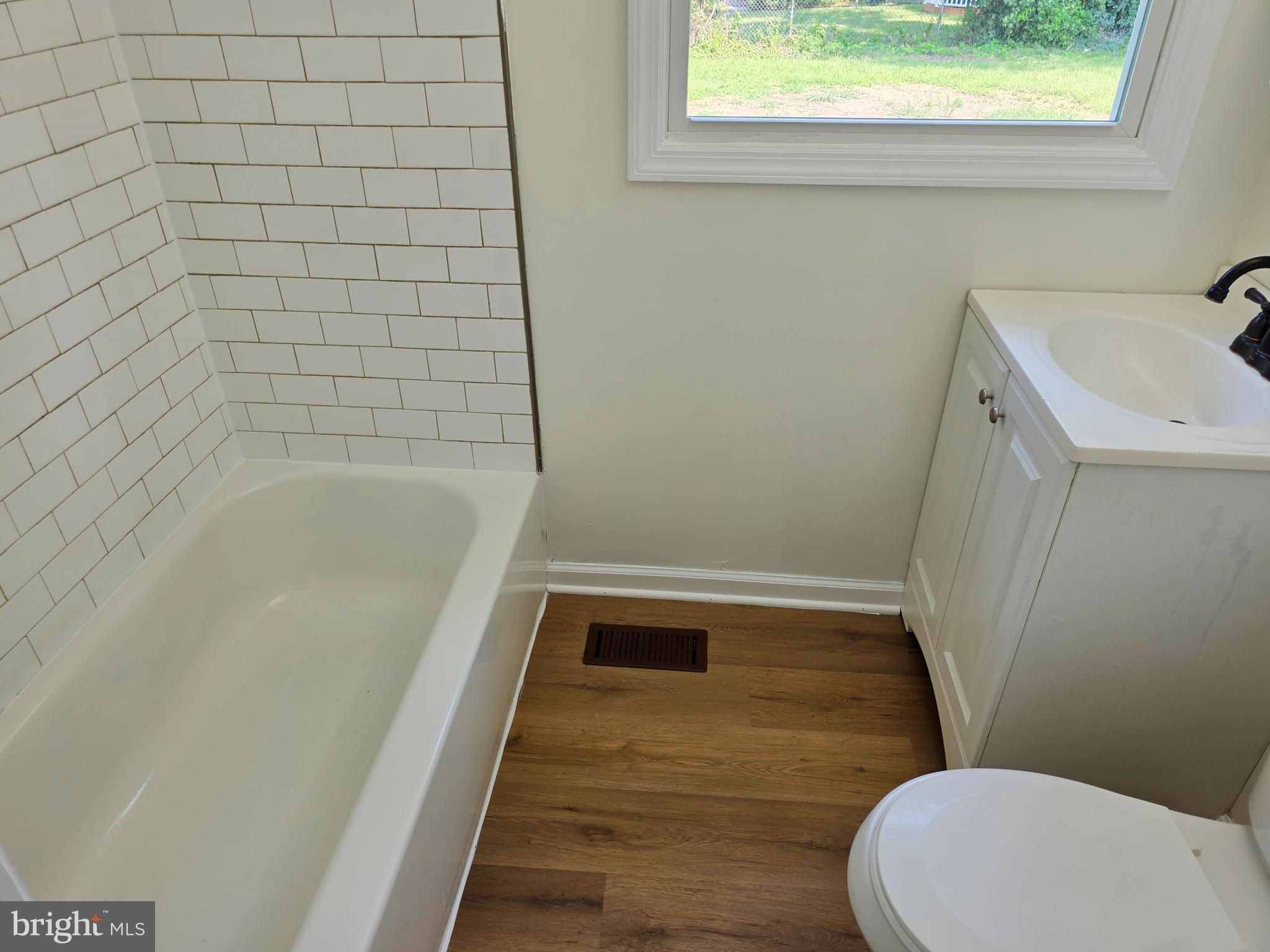 11 Guild Court Willingboro, NJ 08046 - Photo 11 of 16 a bathroom with a sink and a toilet