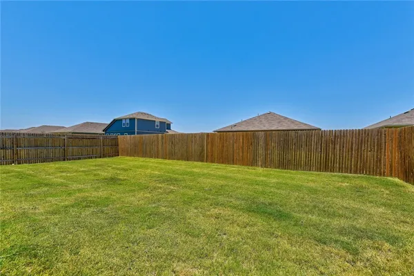 a view of an outdoor space and a yard