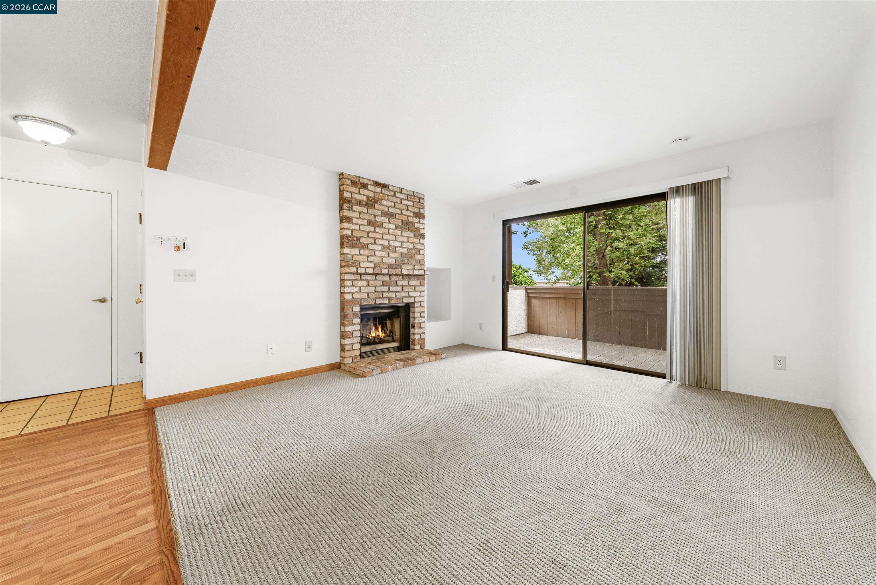 2055 Sierra Road, Unit 106 Concord, CA 94518 - Photo 5 of 37 an empty room with windows