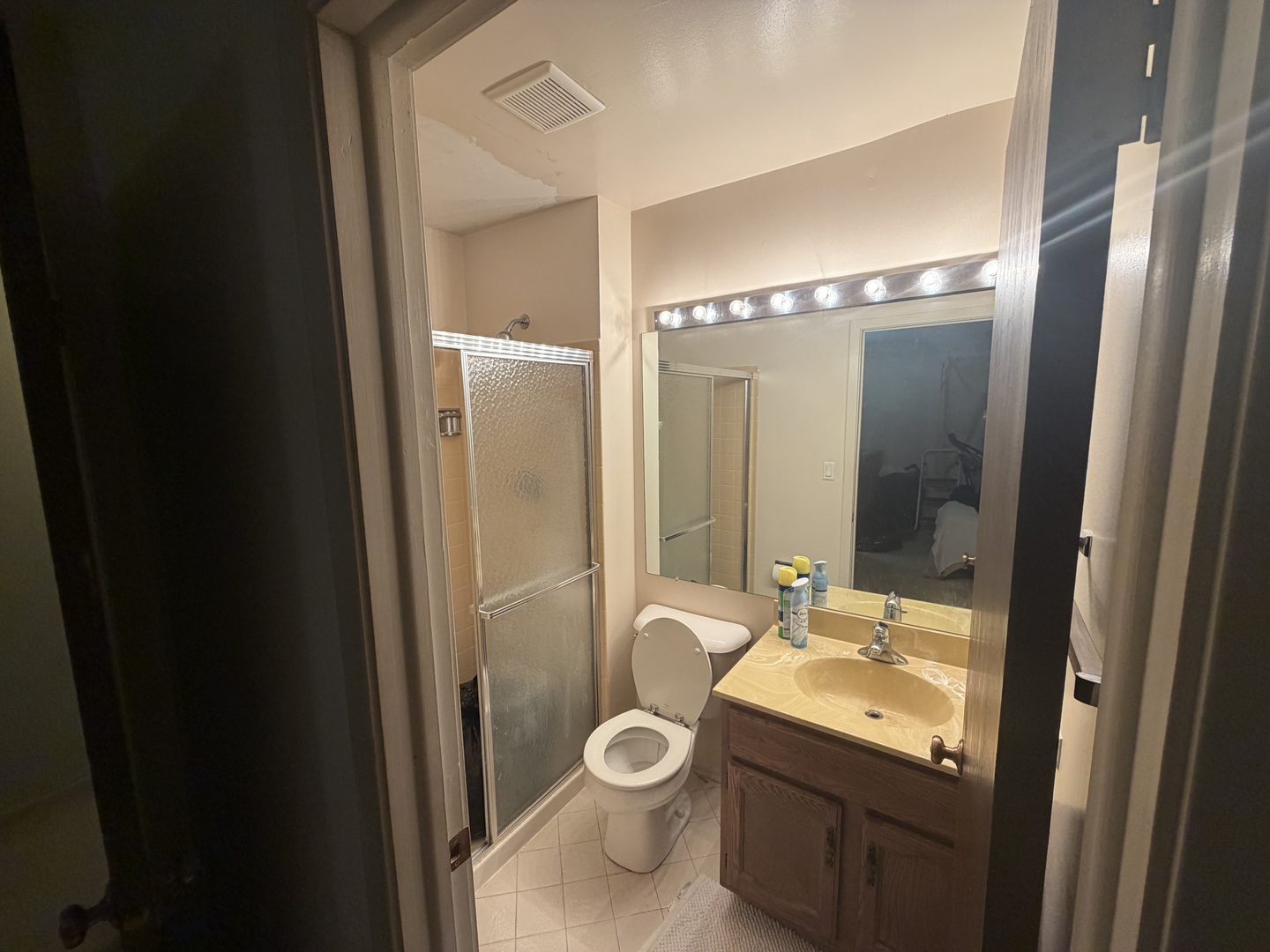 5149 Coventry Lane, Unit 6B1 Gurnee, IL 60031 - Photo 17 of 19 a bathroom with a granite countertop sink toilet and shower
