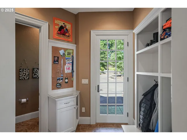 a view of hallway with washer and dryer