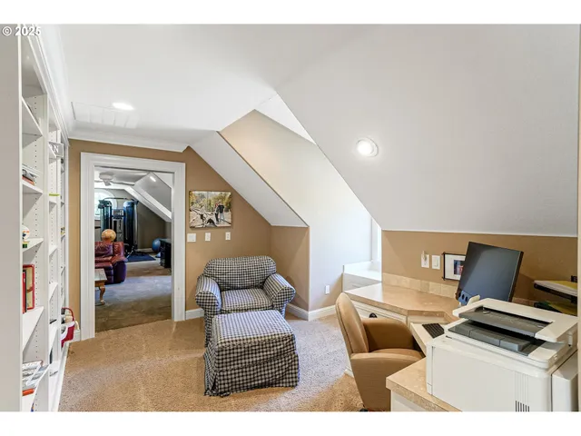 a living room with furniture and a night stand