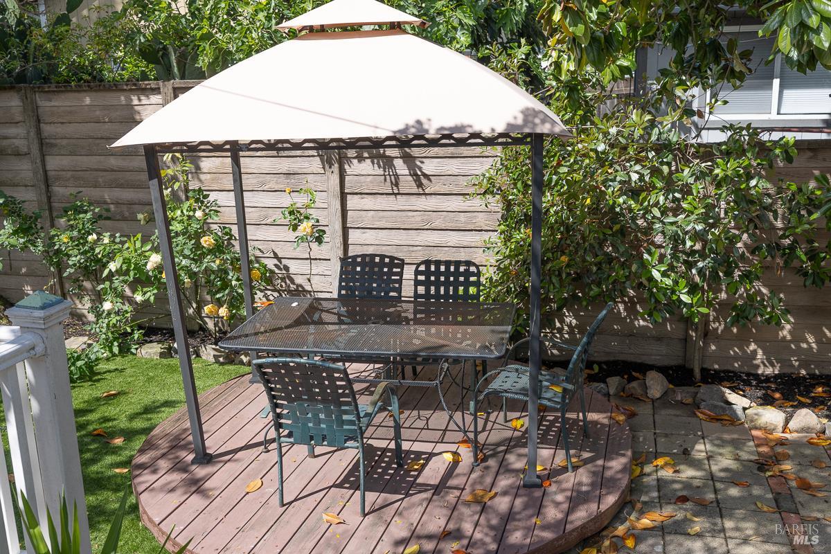 1685 West College Avenue Santa Rosa, CA 95401 - Photo 12 of 45 a view of patio with table and chairs and potted plants
