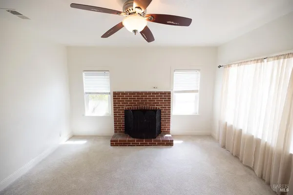 a kitchen with stainless steel appliances a refrigerator sink and stove