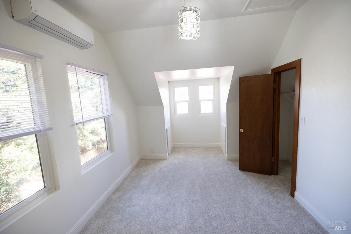 1685 West College Avenue Santa Rosa, CA 95401 - Photo 34 of 45 an empty room with windows and closet