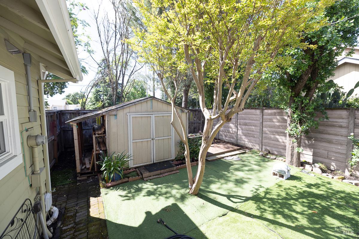 1685 West College Avenue Santa Rosa, CA 95401 - Photo 9 of 45 a backyard of a house with lots of green space