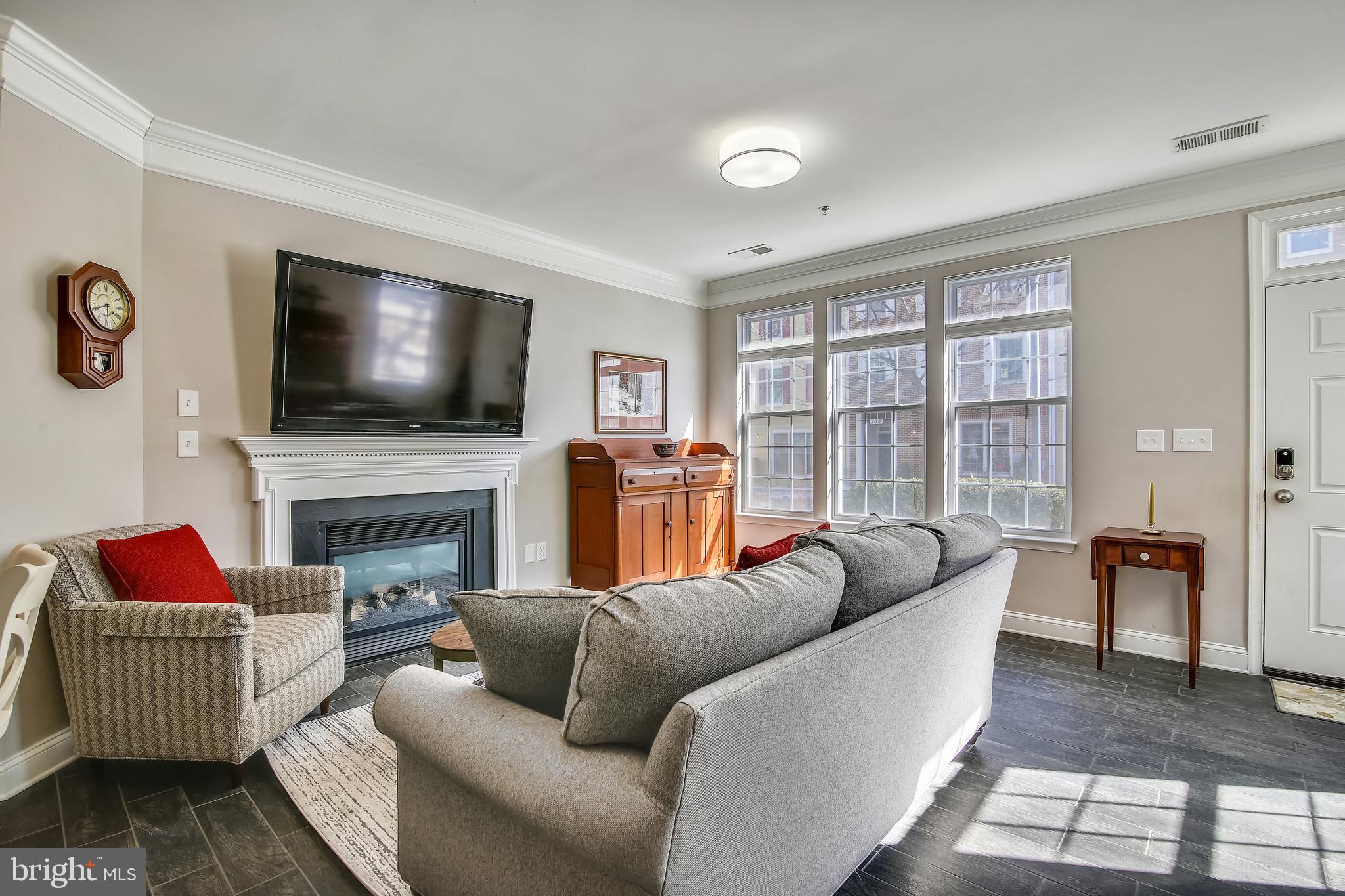 123 Bucksfield Road Gaithersburg, MD 20878 - Photo 5 of 83 Keep warm by the gas fireplace