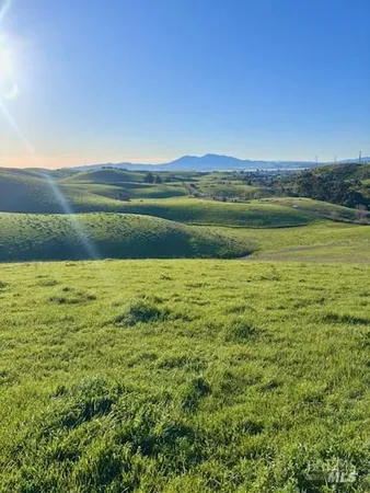 a view of lake with green space